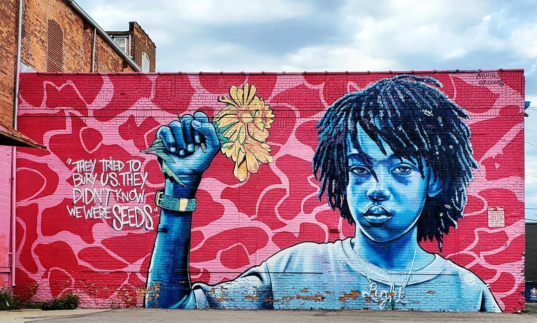 mural in Detroit by artist Bmike.