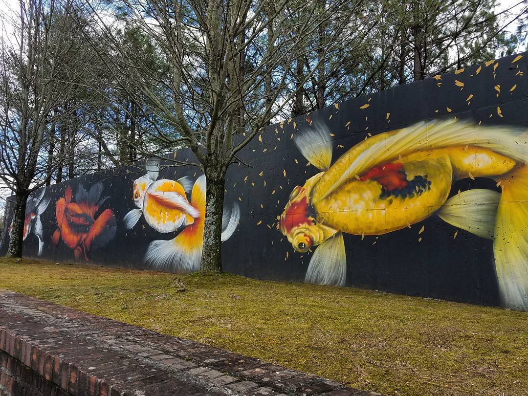mural in Atlanta by artist rising red lotus.