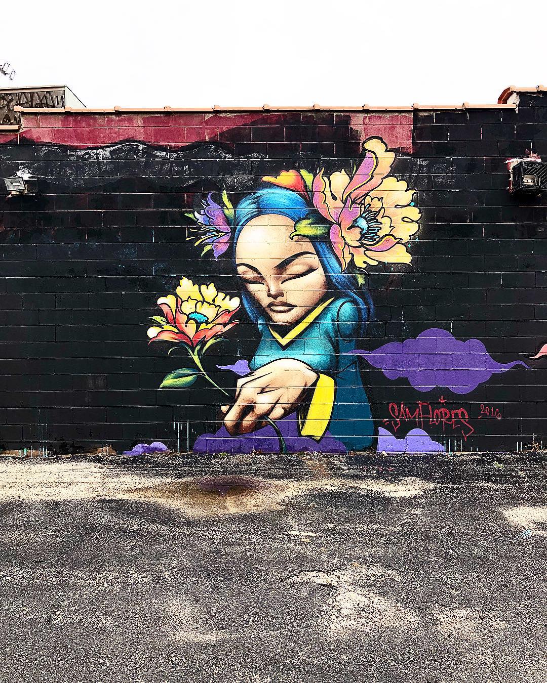 mural in Chicago by artist Sam Flores.