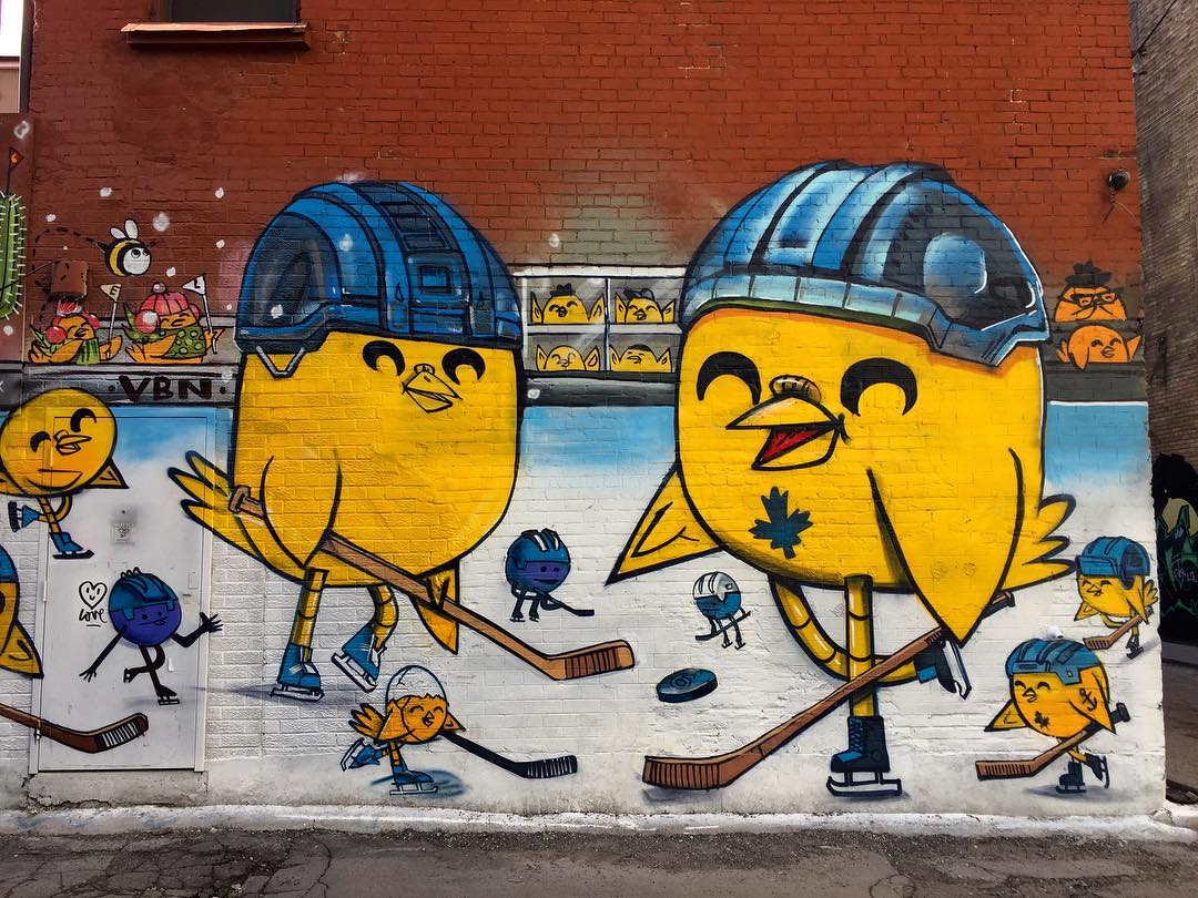 mural in Toronto by artist uber5000. Tagged: animals, sports